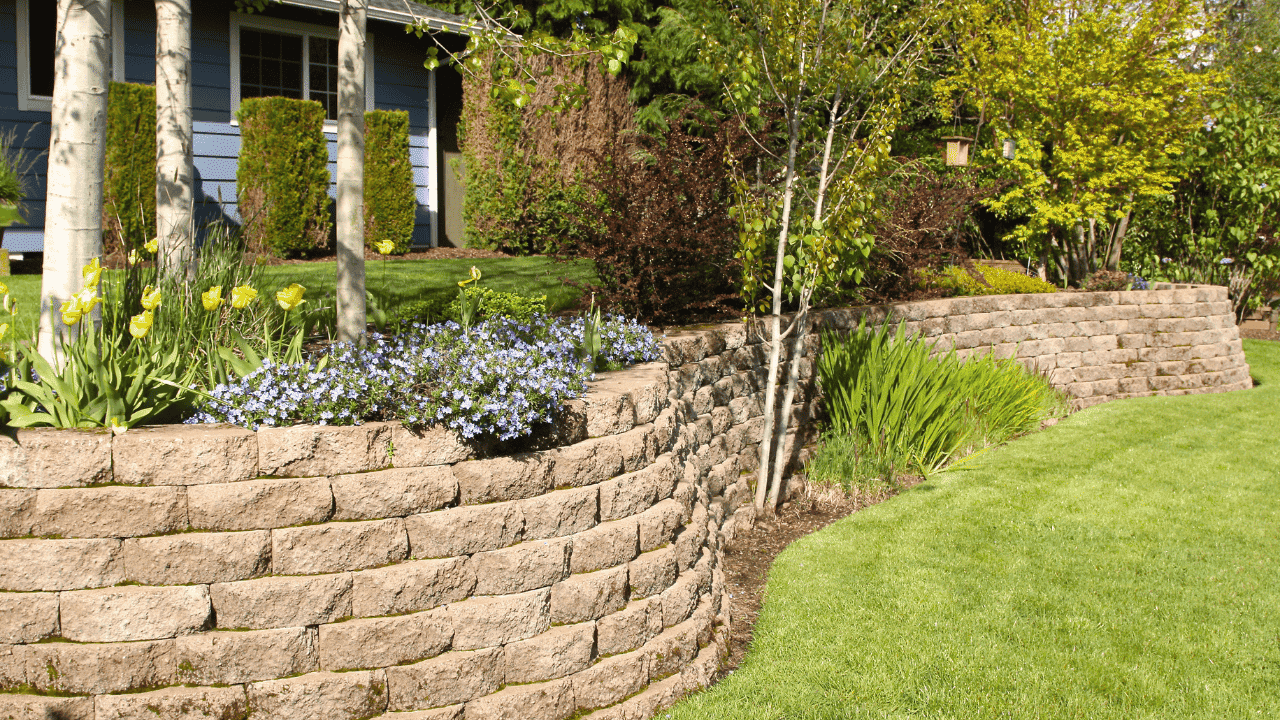 Natural stone wall on Priddis acreage property